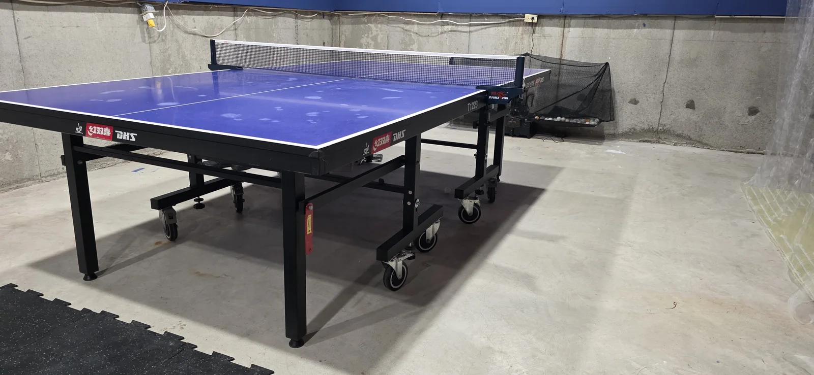 Two professional table tennis tables in the dedicated Barrhaven training area