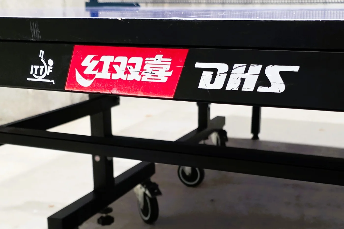 DHS table brand and ITTF approval mark on the professional table tennis table